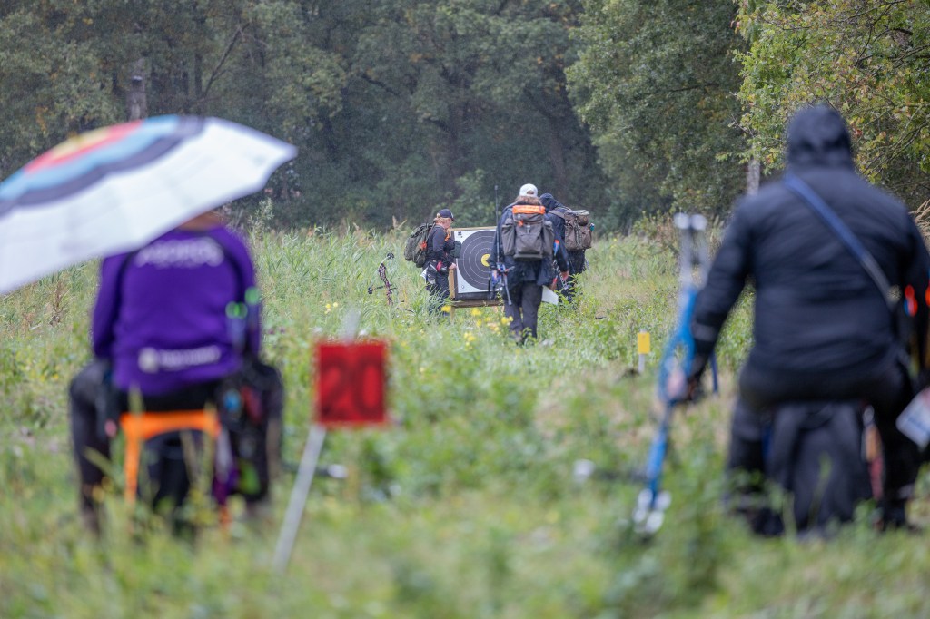 Archers walking to target, compound bow, forest, archery tournament, field archery, nationals, NK Veld, Dutch Championship